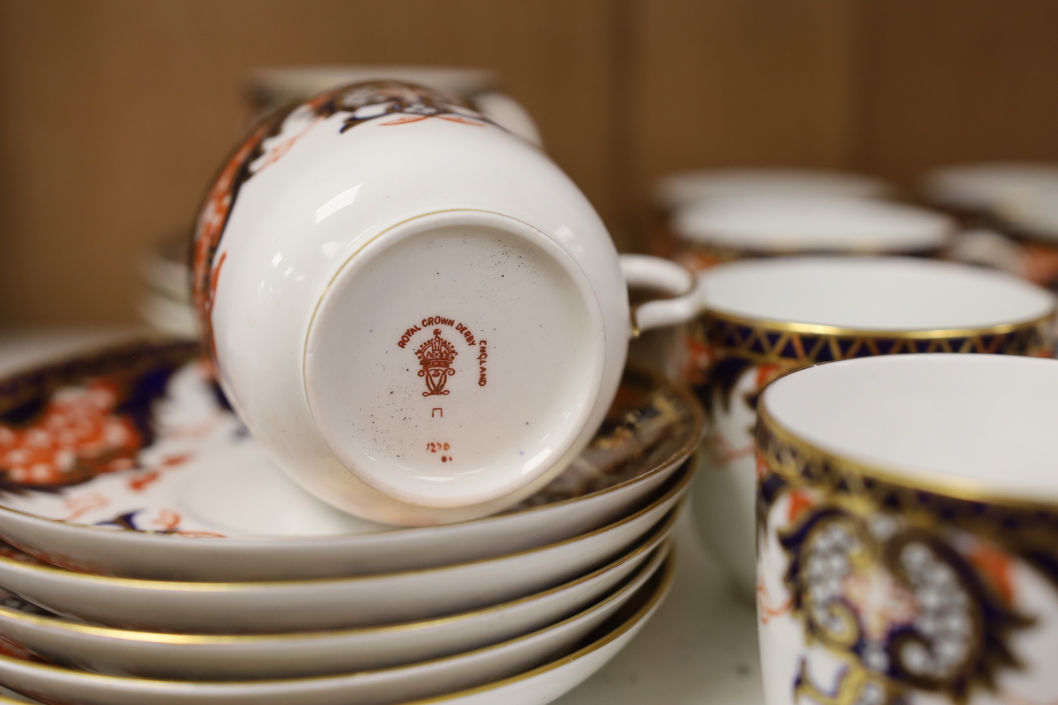 A Royal Crown Derby Imari pattern 1270 part coffee set and Royal Worcester coffee cans etc.